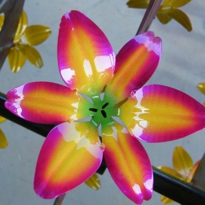 pink and yellow metal flower